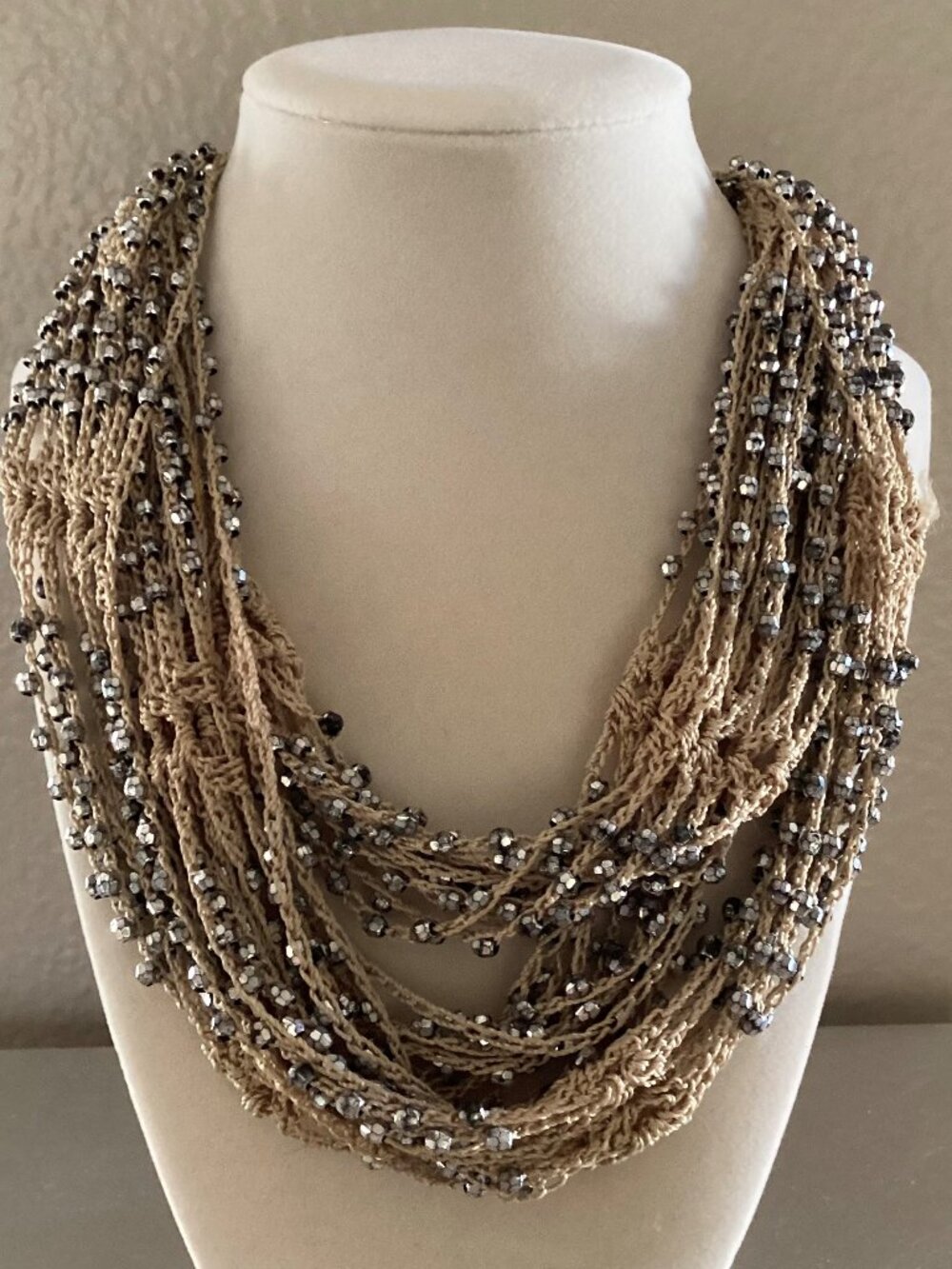 Tan crocheted necklace with silver beads, adjustable, 32 in. long